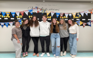 Seven MTHS seniors standing for a photo after graduating from Atlantic Cape