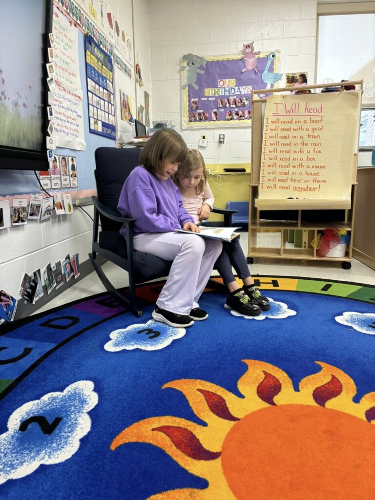Grace and Evelyn Casper enjoy reading at Middle Township Elementary School #1 Preschool. Middle Township Public Schools received a grant that will support an ongoing early literacy program. 