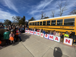 Elementary #1 Students lined up outside to surprise school bus driver