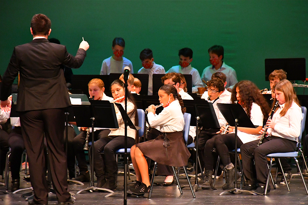 Middle Township students playing instruments during a performance at the Middle Township Pac Center