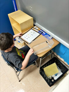 Two aides support students’ individualized instructional needs. 